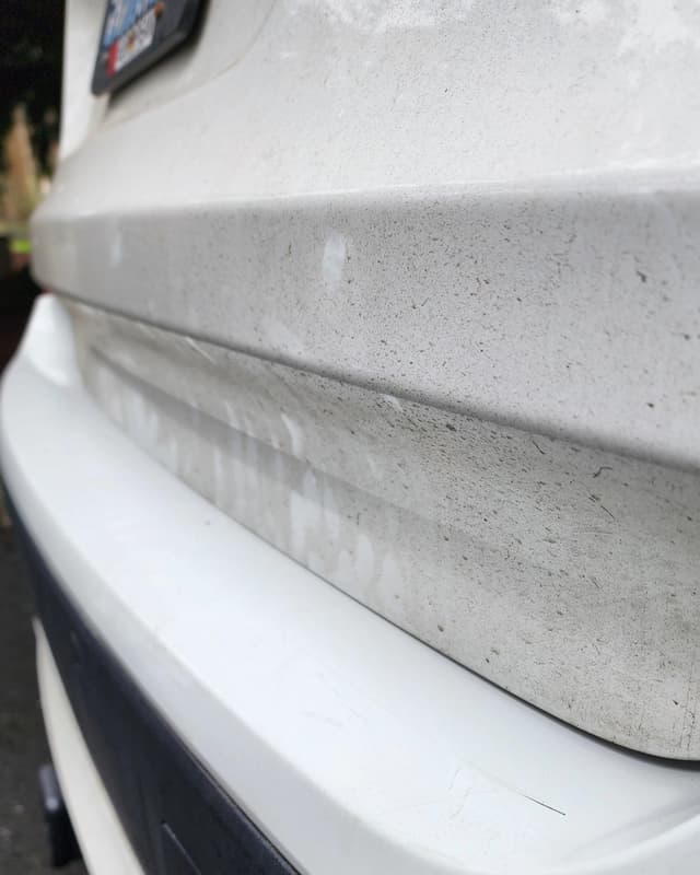 a dirty car bumper
