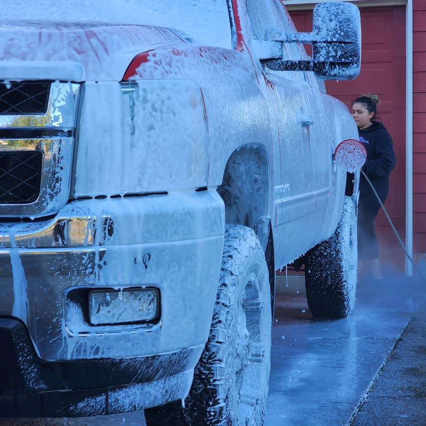 a vehicle covered in soap suds